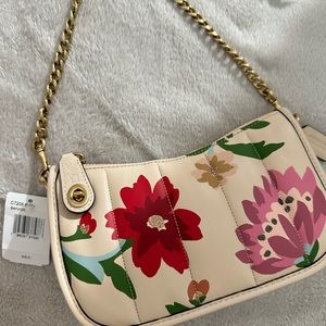 Swinger 20 With Quilting And Floral
Bouquet Print, small chain